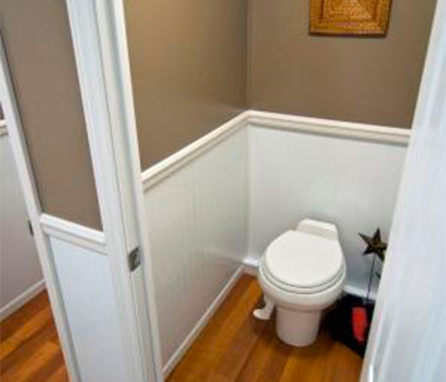 toilet inside restroom trailer