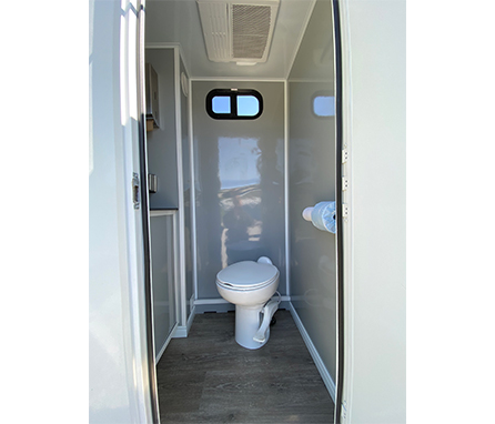 toilet inside portable restroom