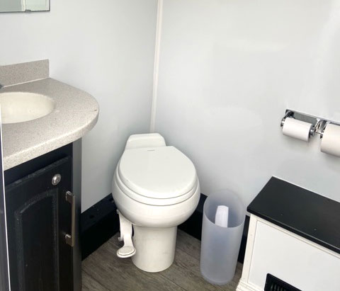 toilet in luxury restroom trailer