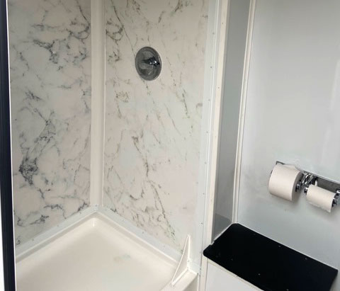 shower in luxury restroom trailer